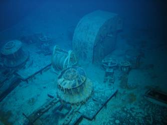 Forecastle capstans and anchor cable secured on deck